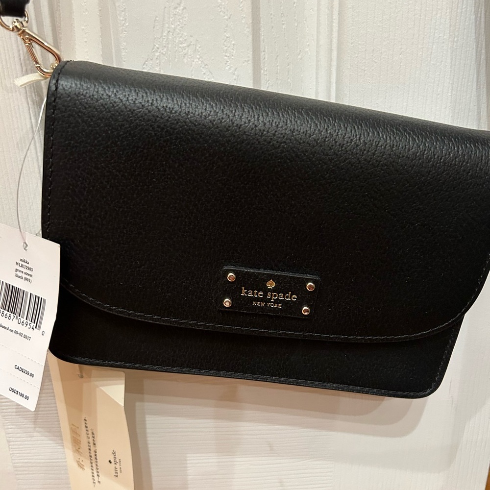 Kate Spade Outlet Mikka Handbag Never used with tags still on it.